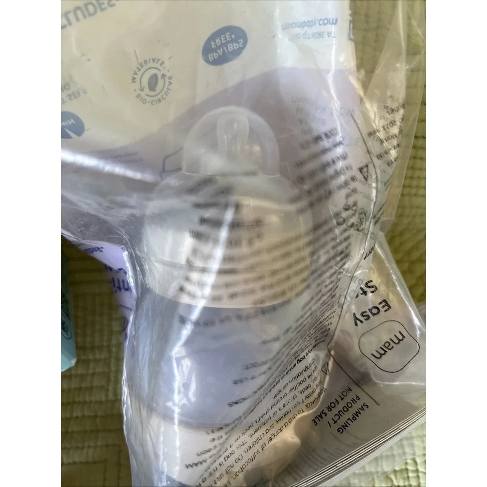 NUK 5oz & mam 4.5 Oz & 2 Dr Brown Nipples Lot